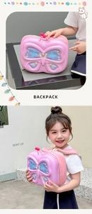 Detail of pink 3D butterfly toddler backpack featuring embossed wings and antennae decoration