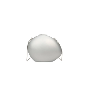 Detail of silver oval acrylic clutch bag featuring matte metallic finish and chain strap