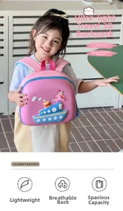 Pink EVA cartoon backpack with 3D ship design worn by a young girl in a bright room