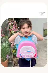 Toddler girl wearing 3D pink airplane backpack with EVA hard shell in outdoor setting