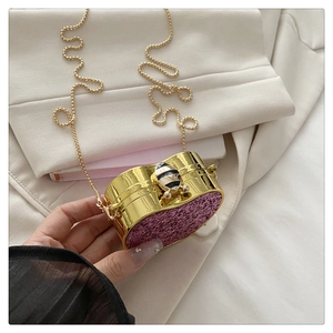 Purple glitter heart-shaped evening bag with a gold bee clasp and bead chain strap