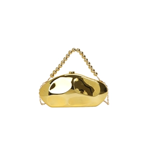 Irregular gold shell clutch bag with beaded handle and fine chain shoulder strap