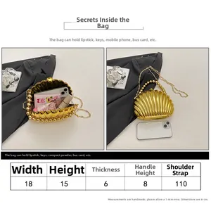 Detailed size chart and internal capacity guide for the gold shell evening clutch bag