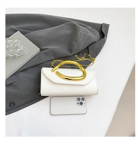 White smooth leather clutch bag with gold curved metal handle and matching chain strap