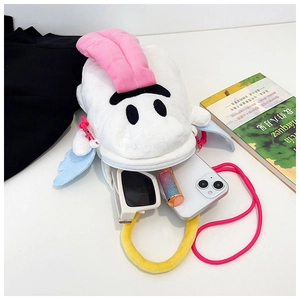 Détail intérieur du sac clown en peluche avec téléphone, lunettes de soleil et rouge à lèvres