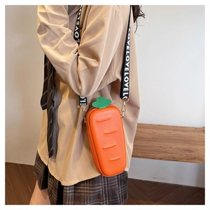 Detail of creative carrot-shaped silicone mini crossbody bag with wide LOVE strap