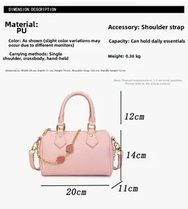 Detailed dimensions of pink lychee textured Boston bag with strawberry pendant