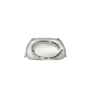 Silver hard shell clutch bag with large metallic ring handle and crossbody chain strap