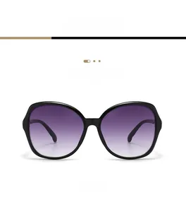 Front view detail of C1 oversized black frame sunglasses with purple gradient lenses