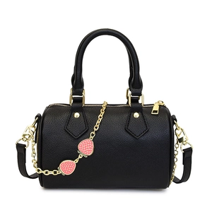 Fashionable black Boston bag with lychee texture and strawberry chain charm detail