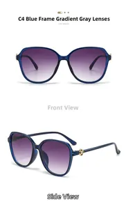 Detail of blue oversized sunglasses featuring a golden floral hinge with rhinestones