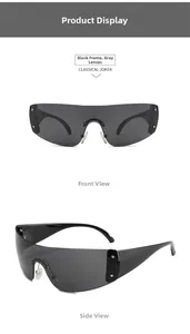 Detail of futuristic oversized black sunglasses with silver star studs and grey lenses