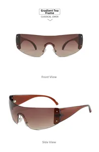 Detail view of oversized shield sunglasses with star rivets and brown gradient lenses
