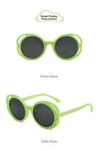 Detail view of green hollow-out baby sunglasses with grey lenses in front and side angles