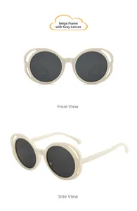 Detail view of beige round hollowed-out frame kids sunglasses with grey lenses