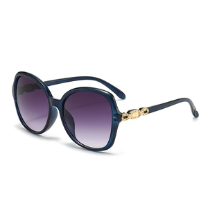 Fashionable oversized women's sunglasses with dark blue frame and purple gradient lenses