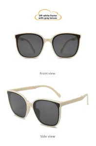 Detail of cream white cat-eye sunglasses for kids with grey lenses and folding design