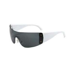 Futuristic oversized Y2K sunglasses with wide white frames and gold star rivets