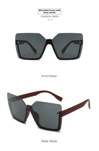 Detailed view of wine red geometric sunglasses with grey lenses and metallic rivet accents