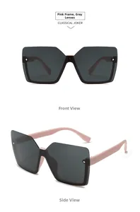 Futuristic pink oversized square sunglasses with dark grey lenses in front and side views