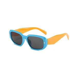 Blue and orange kids sunglasses with UV protection and stylish silver rivet accents