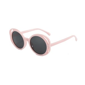 Hollow frame pink sunglasses for kids with grey lenses for sun protection on white background