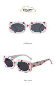 Front and side view of white heart pattern kids sunglasses with dark grey lenses