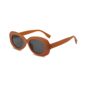 Futuristic matte caramel oval oversized sunglasses with dark lenses for chic street style