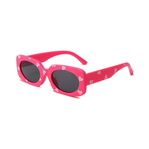 Pink heart print children's rectangle sunglasses with black lenses in a stylish Y2K design