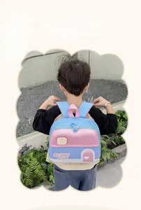 Outdoor view of child wearing a colorful house-shaped EVA backpack with Sunny Day print