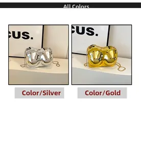 Silver and gold mirror finish bra-shaped acrylic clutch bags with fine chain straps