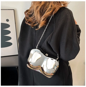 Silver mirror finish irregular shaped clutch with detachable metal chain strap
