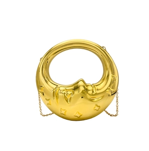 Glossy golden crescent moon evening bag with celestial face engraving and chain strap