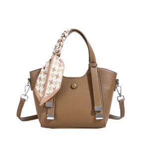 Brown litchi grain bucket bag with a silk scarf handle and adjustable shoulder strap