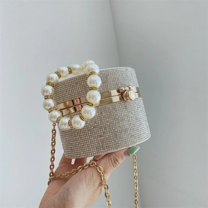 Sparkling silver rhinestone cylinder clutch bag with elegant faux pearl handle for women