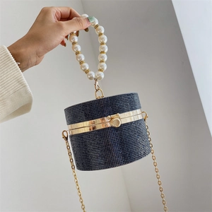 Elegant navy blue rhinestone cylindrical evening bag with pearl handle and gold chain