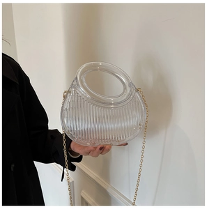 Vertical striped acrylic semi-circle clutch with gold chain and round handle