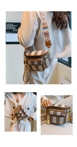Close-up of geometric striped chest bag with wide woven strap and golden lock hardware