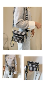 Detail of checkered crossbody bag with adjustable geometric woven strap and gold zippers