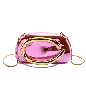 Pink acrylic evening clutch bag with metallic mirror finish and golden C-handle