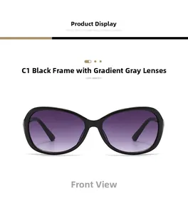 Detail of oversized sunglasses with black frames and purple gradient lenses