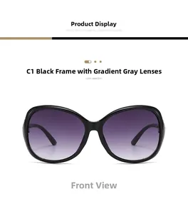 Detail of oversized butterfly sunglasses with black frame and purple gradient lenses