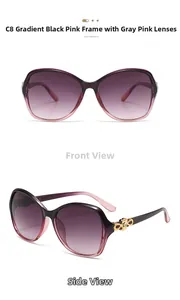 Detail of oversized sunglasses with gradient lenses and gold floral metal temple decor