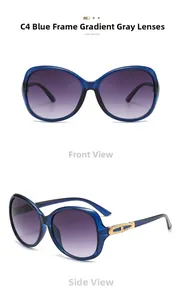 Detail of blue translucent oversized butterfly sunglasses with gold hollow metal decor