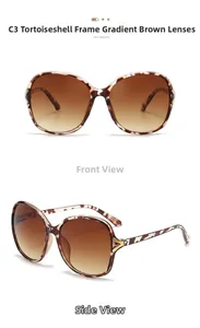 Detail view of oversized tortoise shell sunglasses with gradient brown lenses and frame