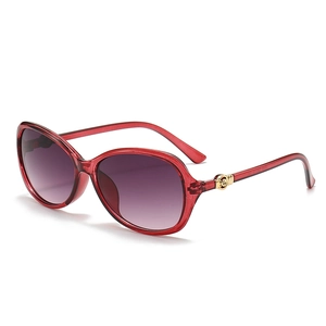 Elegant oversized sunglasses for women with dark red frames and purple gradient lenses