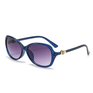 Women's oversized fashion sunglasses with blue frames and purple gradient lenses