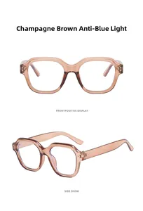 Macro detail of champagne tea anti-blue light glasses with rivet accents and wide temples
