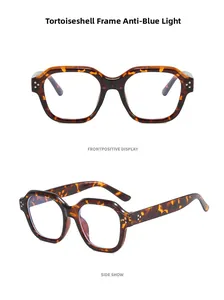 Detail of tortoiseshell square frames with blue light filter and triple metal studs