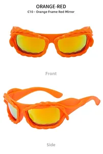 Detail of orange wrap-around sunglasses with twisted frame and red gradient lenses